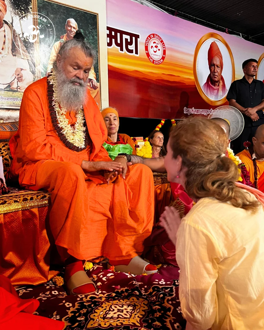 International devotees arriving at OM Ashram for Guru Purnima.